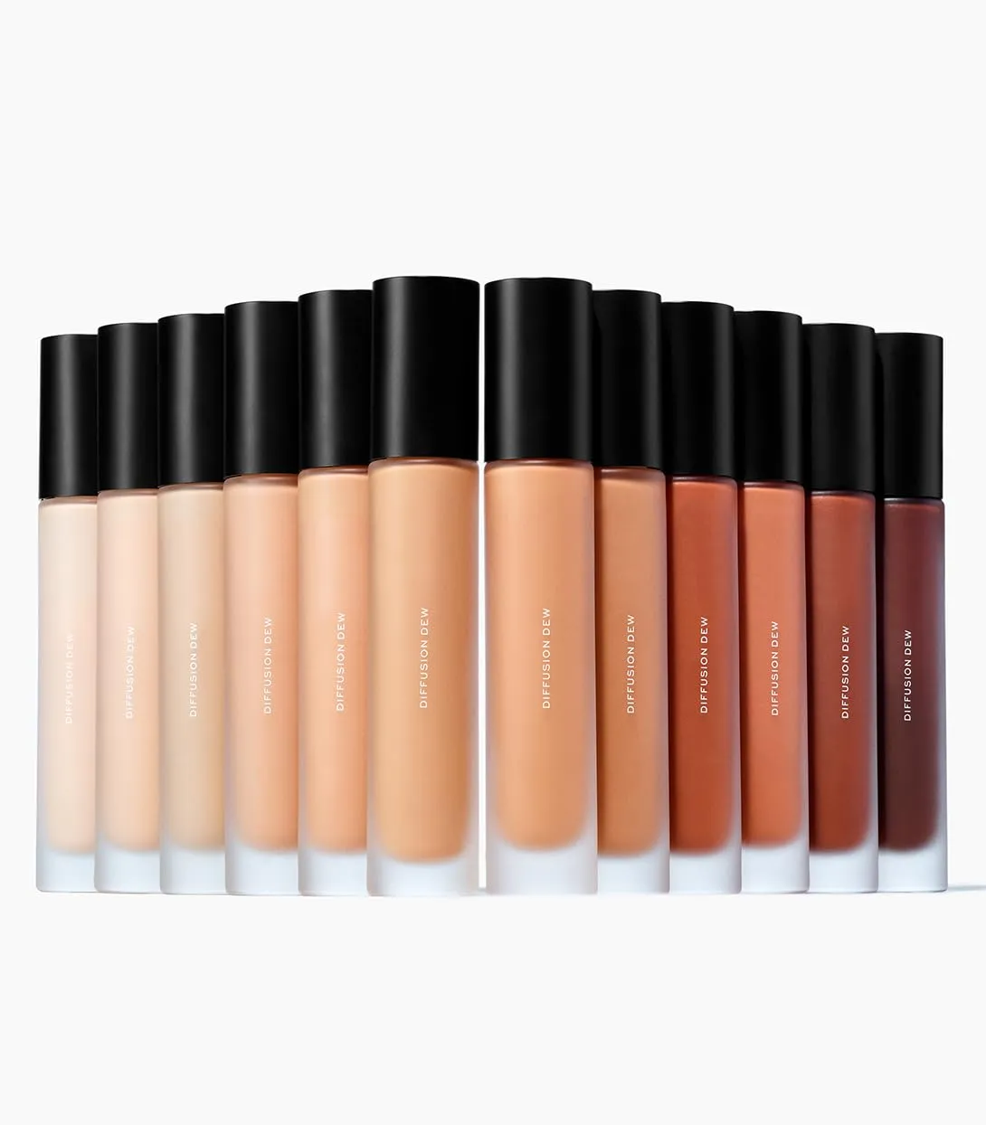 MAKE Beauty Diffusion Dew Skin Tint. Sheer to Medium Coverage Radiant Finish. Blurring, Smoothing, and Brightening for Glowing Complexion. Enhanced with Niacinamide and Adenosine. Caramel 08